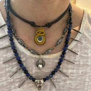 Feather and skull necklace